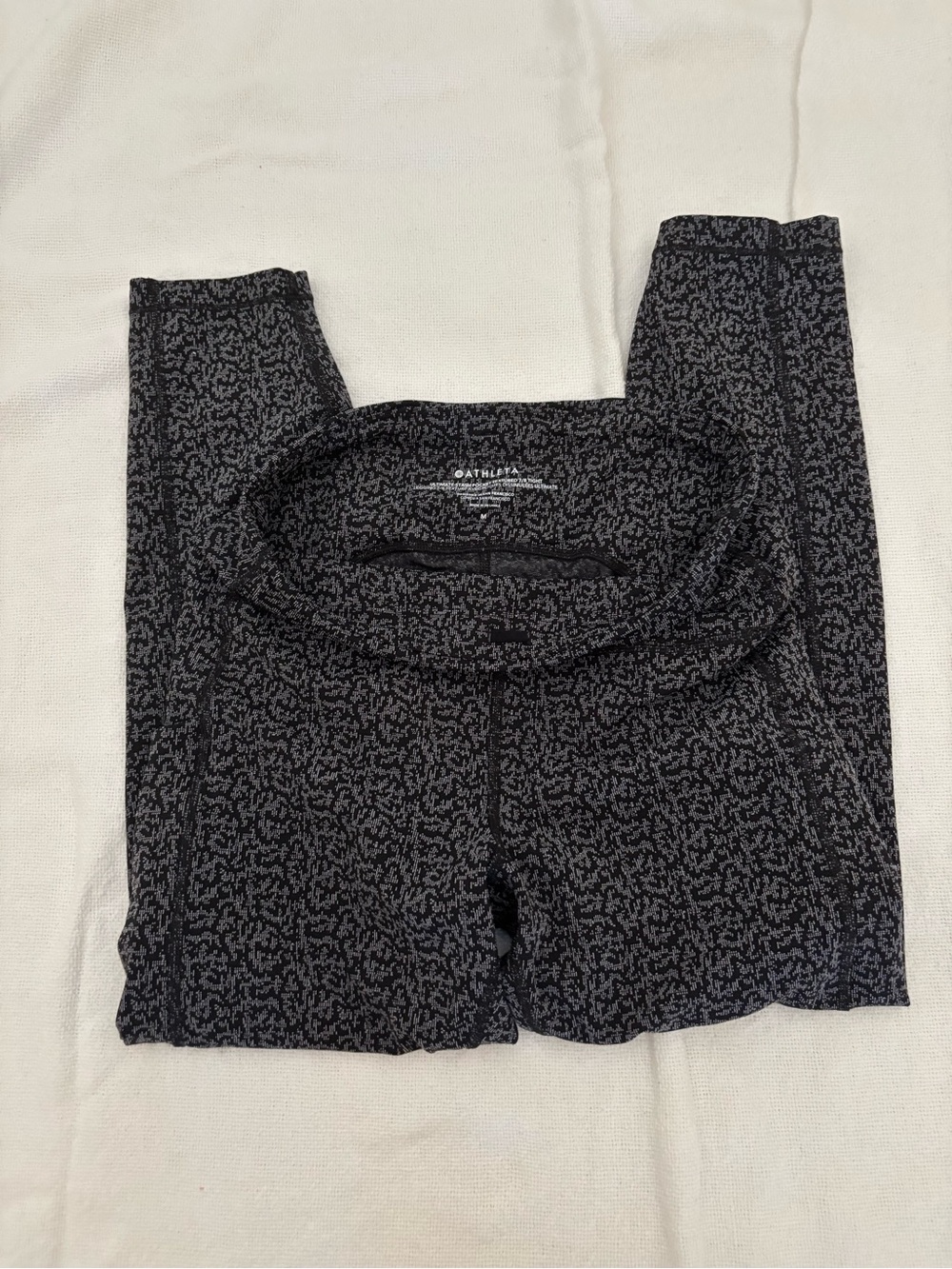 Athleta ultimate stash pocket Textured 7/8 Tight